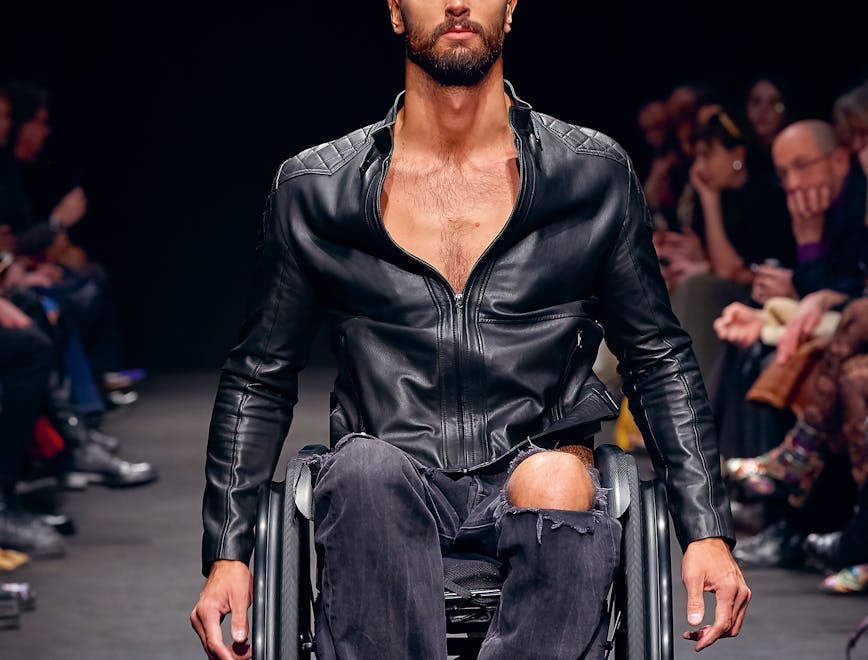 clothing apparel person human chair furniture shoe footwear jacket coat